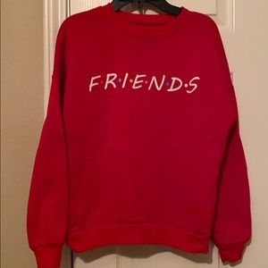 Bright red sweater.